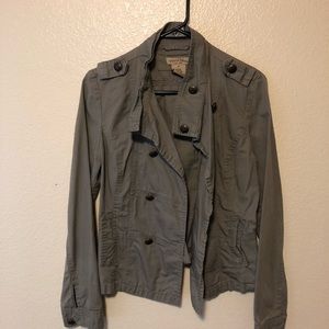 Army green jacket with brass accents